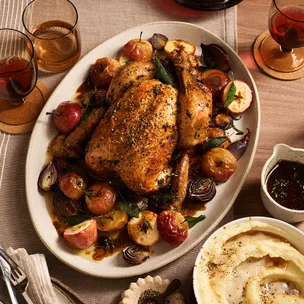 Tender and supple brined chicken with roast apples and parsnip mash