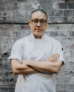 Portrait of chef Dan Hong in his chef whites