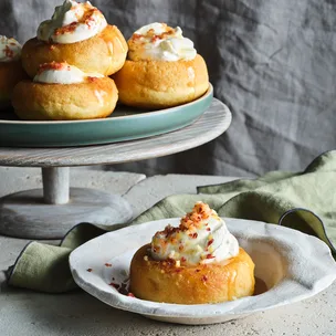 Fennel, honey and ouzo baba with peaches and cream