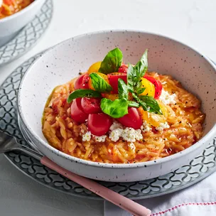Fresh tomato risoni with ricotta and basil