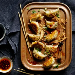 Mushroom gyoza with frizzled enoki mushrooms