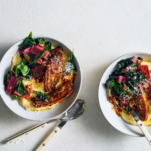 Quick porchetta sitting on a bed of soft polenta