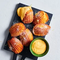 Warm madeleines with yuzu curd